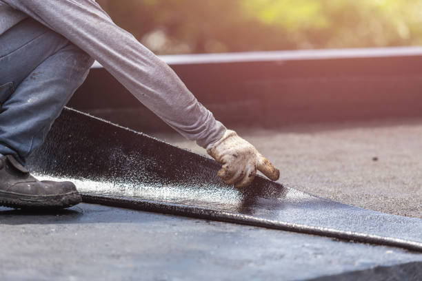 Professional Waterproofing technician working in Towaco, NJ